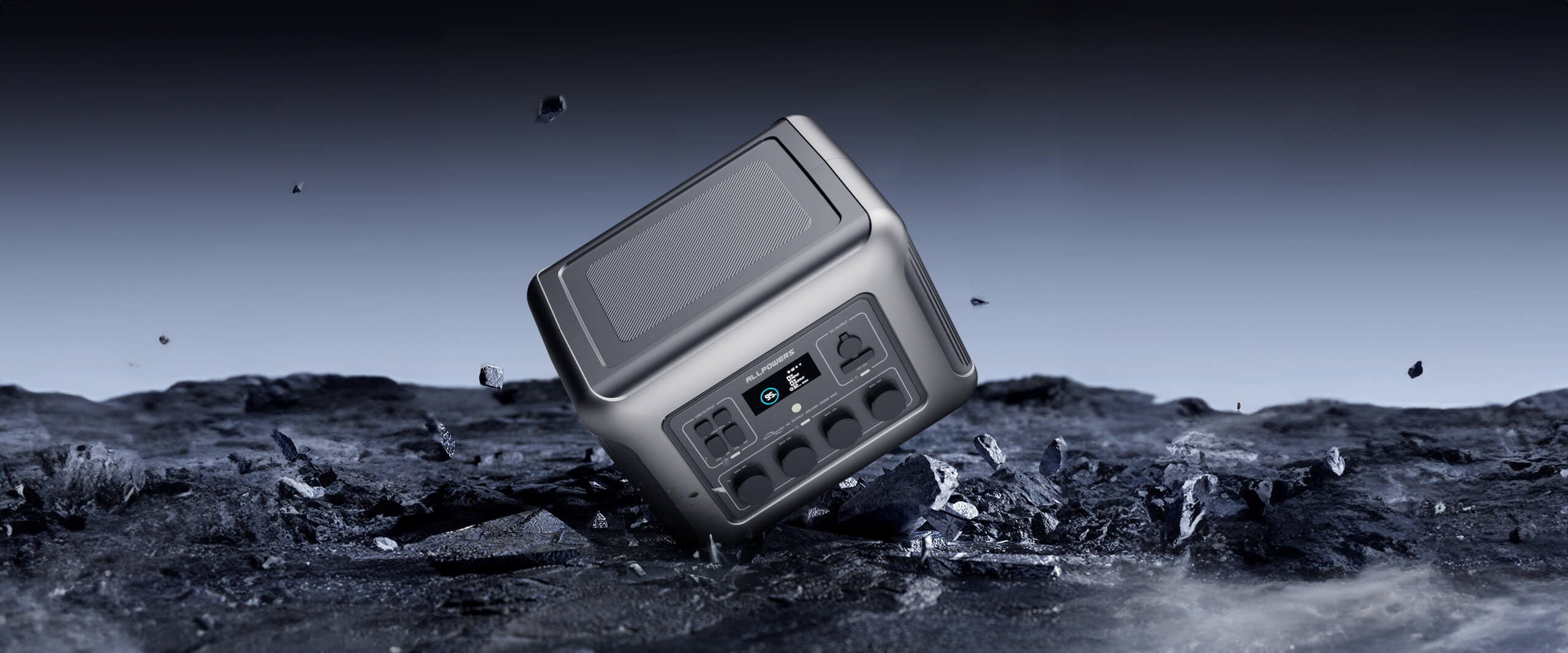 ALLPOWERS R2500 portable power station with LCD display and multiple ports on rocky surface